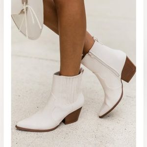 White pointed-toe ankle booties